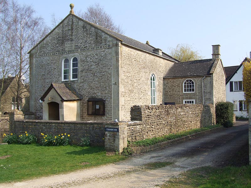 Union Chapel and its stone boundary wall with daffodils